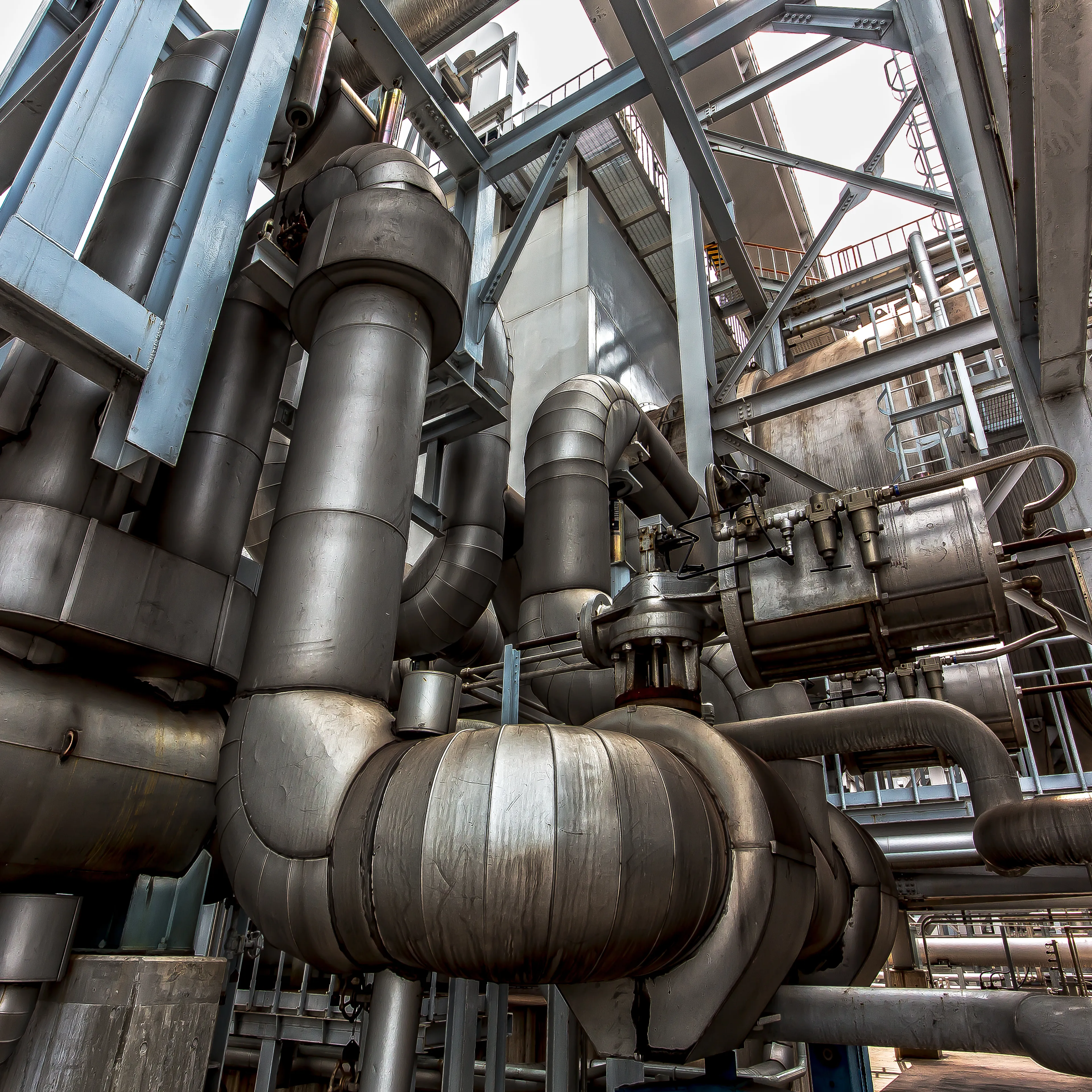 Industrial piping and equipment being assessed for condition