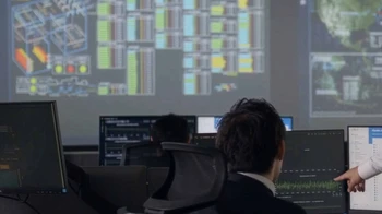 A specialist monitoring power plant equipment remotely
